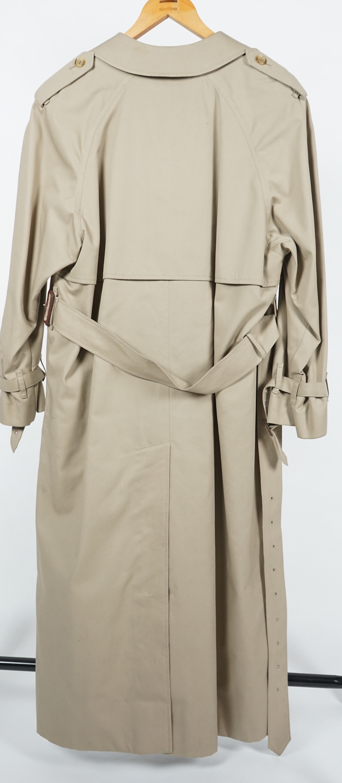 A lady's Burberry trench coat with padded detachable lining, size 12